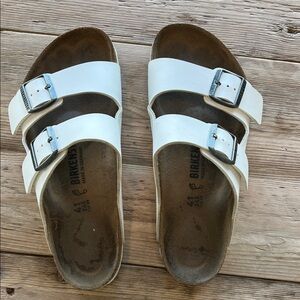 Birkenstock White Arizona Two-Strap Sandals with Silver Buckles